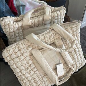 a new day Cream Ruffled Quilted Tote travel bag or daily use